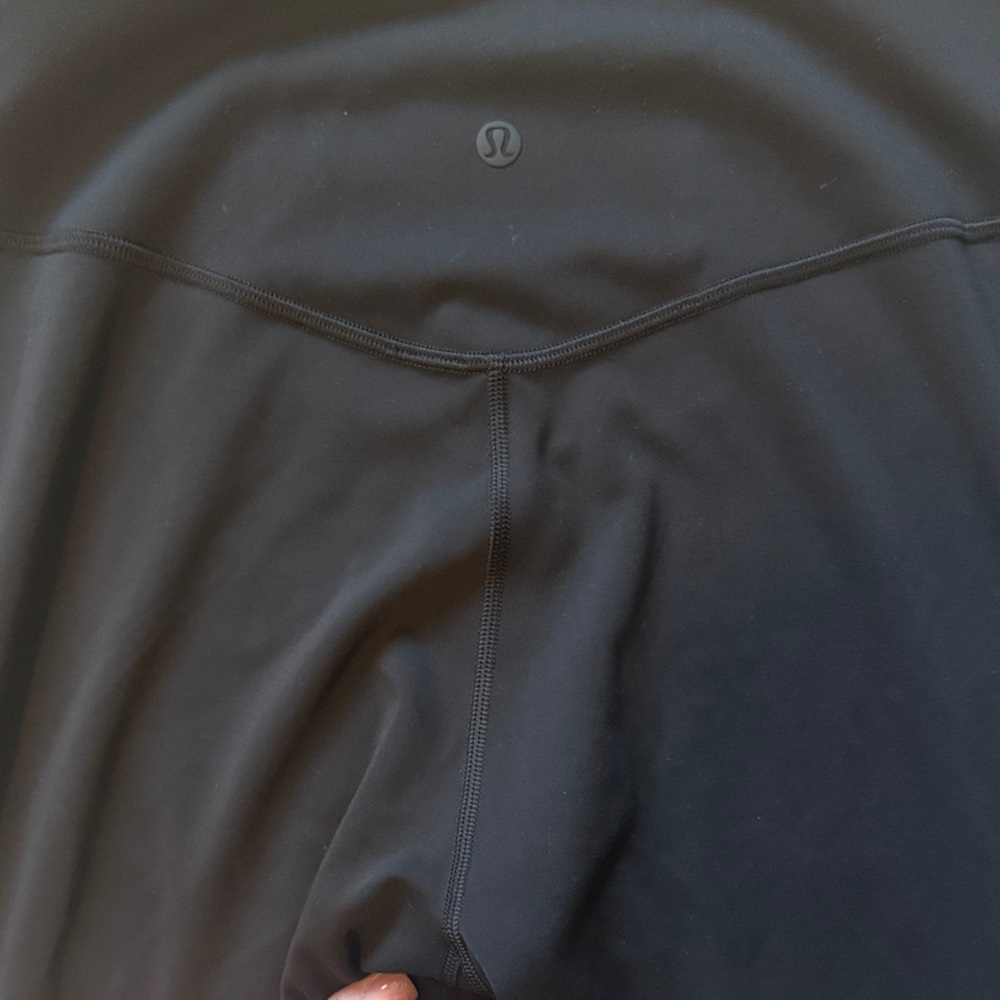 Lululemon black WunderTrain Smooth Cover High Rise Tight 28"